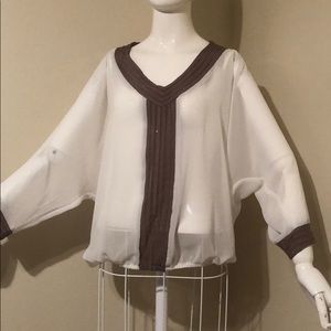 Super cute fun detailed women’s top!